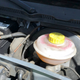 The snood sits to the right of the battery and your life will be much improved if you remove the battery when doing this job.